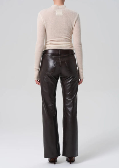 person wearing citizens of humanity womens Genova Low Rise Bootcut in Chocolate leather pant