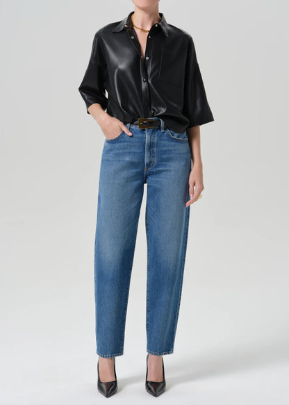 person wearing citizens of humanity womens Taper Jeans In Pastis wash indigo