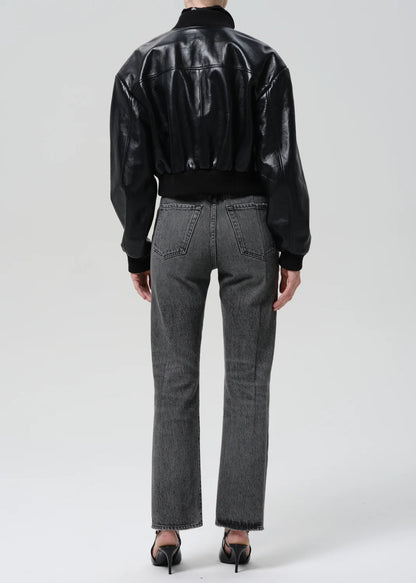 person wearing citizens of humanity womens denim 90's French High Rise Straight Jeans In Lumiere