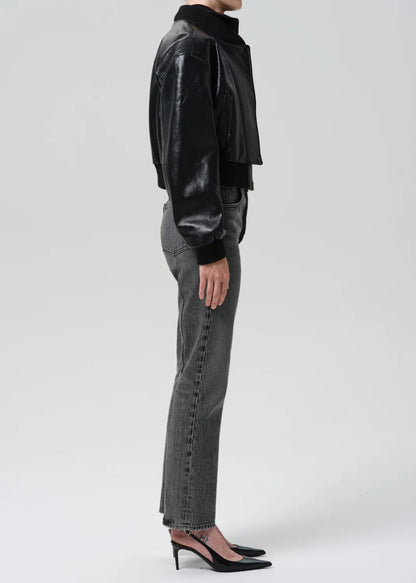 person wearing citizens of humanity womens denim 90's French High Rise Straight Jeans In Lumiere