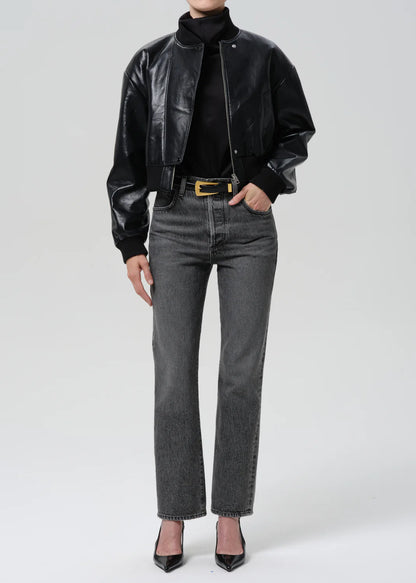 person wearing citizens of humanity womens denim 90's French High Rise Straight Jeans In Lumiere