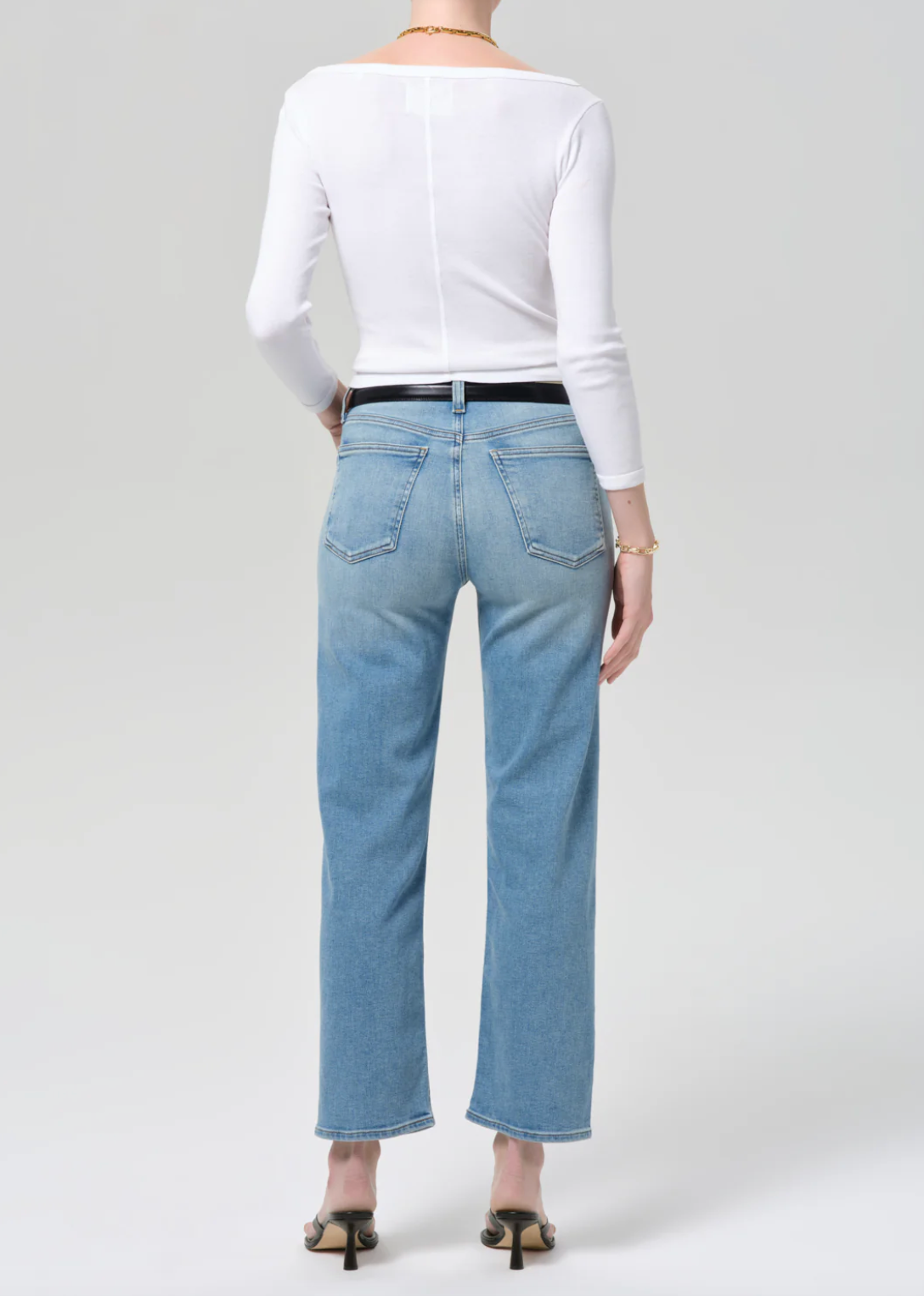 person wearing citizens of humanity womens denim jeans Palma Straight Clean Hem in Luella