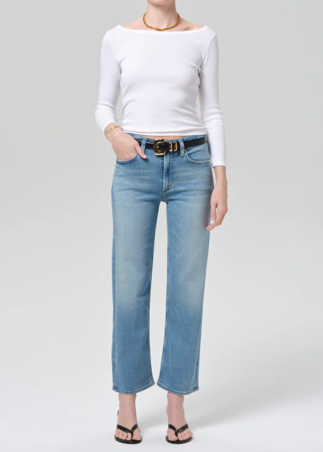person wearing citizens of humanity womens denim jeans Palma Straight Clean Hem in Luella