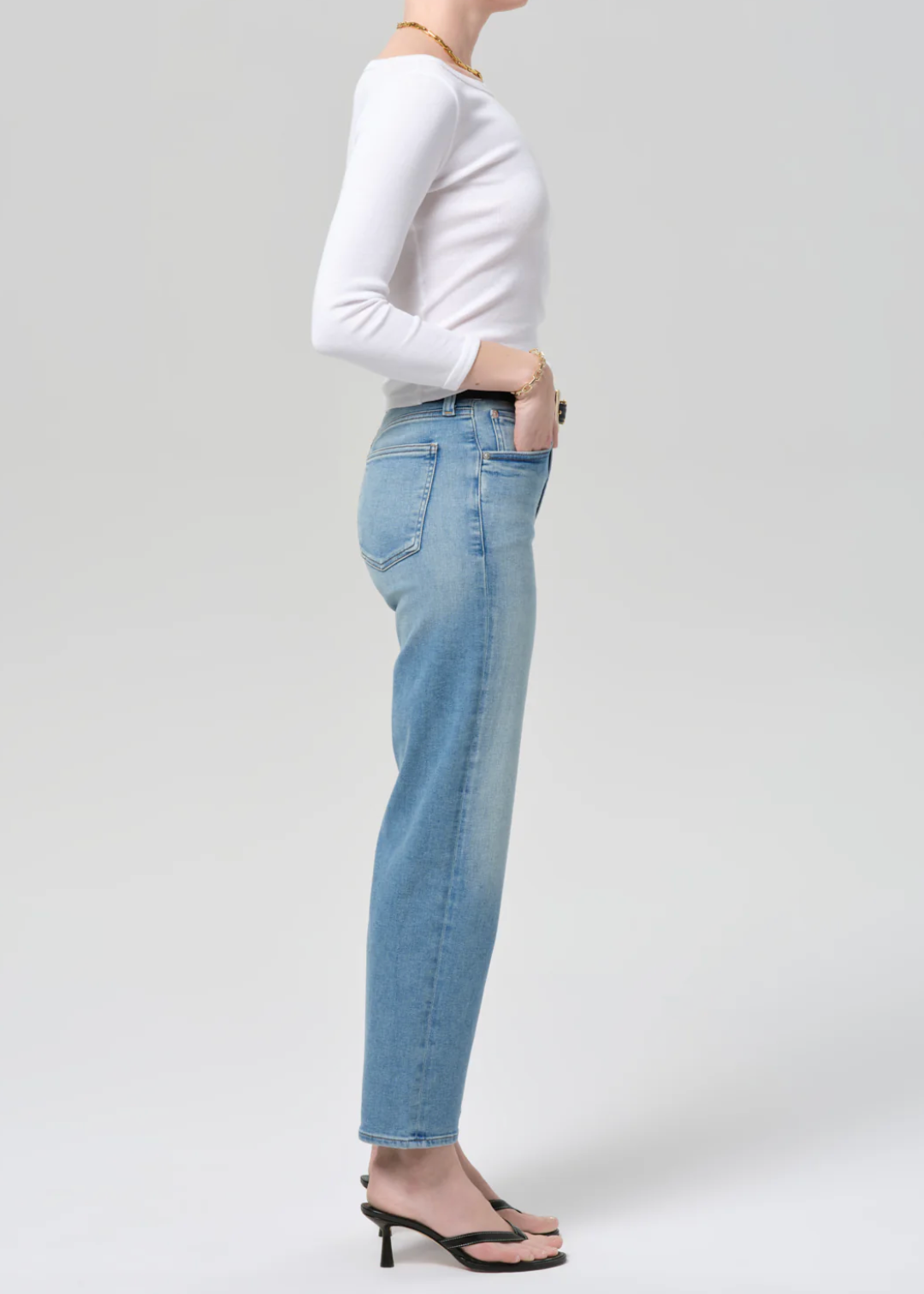 person wearing citizens of humanity womens denim jeans Palma Straight Clean Hem in Luella