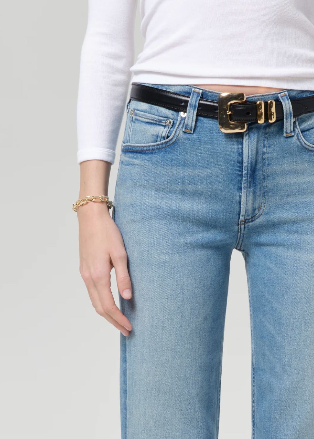 person wearing citizens of humanity womens denim jeans Palma Straight Clean Hem in Luella