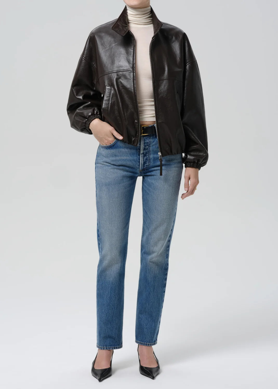 person wearing citizens of humanity womens leather Barracuta Bubble Jacket In Chocolate Dark Brown