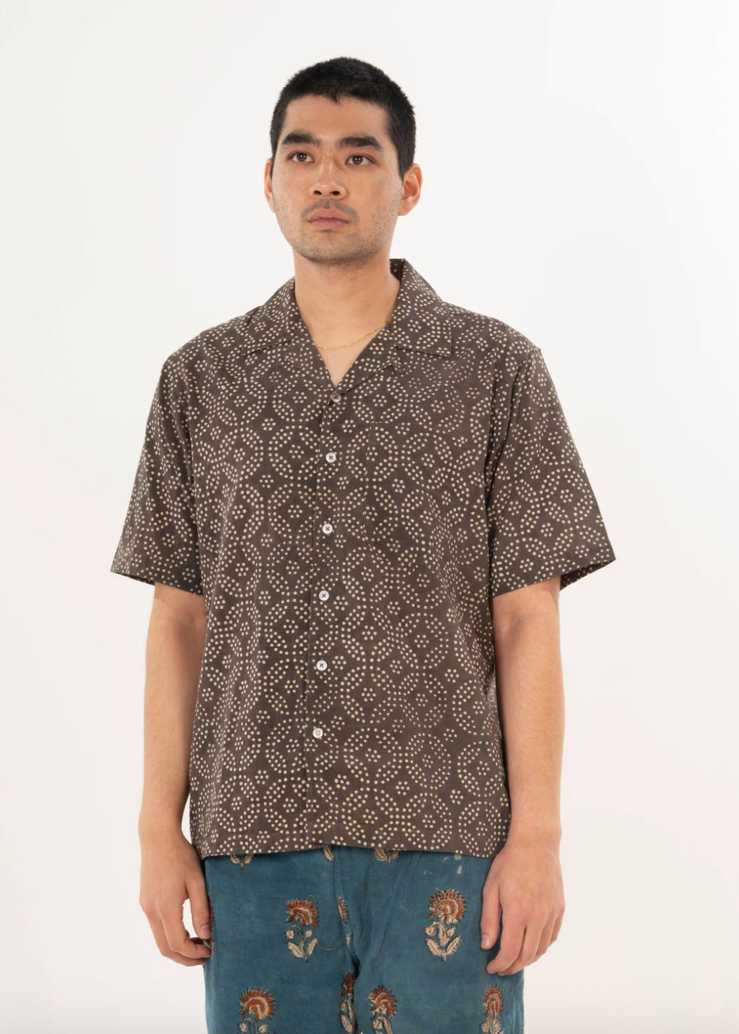 person wearing dushyant mens Short Sleeve Camp Collar Shirt in Brown small circles print