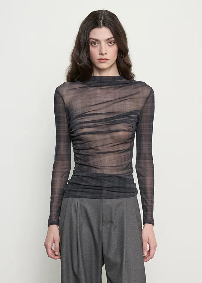 person wearing enza costa Shadow Plaid Mesh Long Sleeve Twist Top