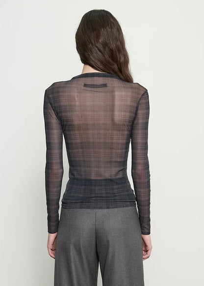 person wearing enza costa Shadow Plaid Mesh Long Sleeve Twist Top
