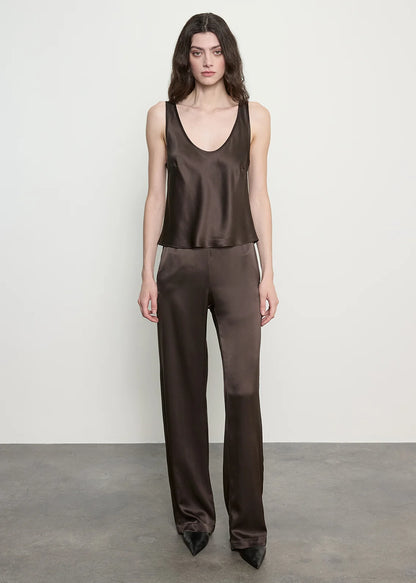 person wearing enza costa Silk Satin Everywhere Pant in Olive Bronze