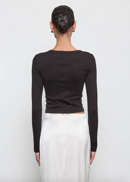 person wearing enza costa Supima Baby Rib Long Sleeve Cropped Top in Black