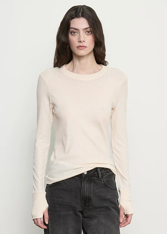 person wearing enza costa womens Cashmere Easy Cuffed Crew in Natural