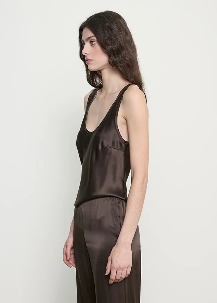 person wearing enza costa womens Silk Satin U Tank in Olive Bronze