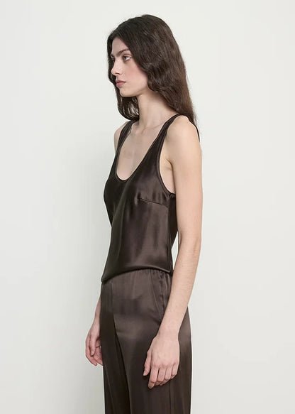 person wearing enza costa womens Silk Satin U Tank in Olive Bronze