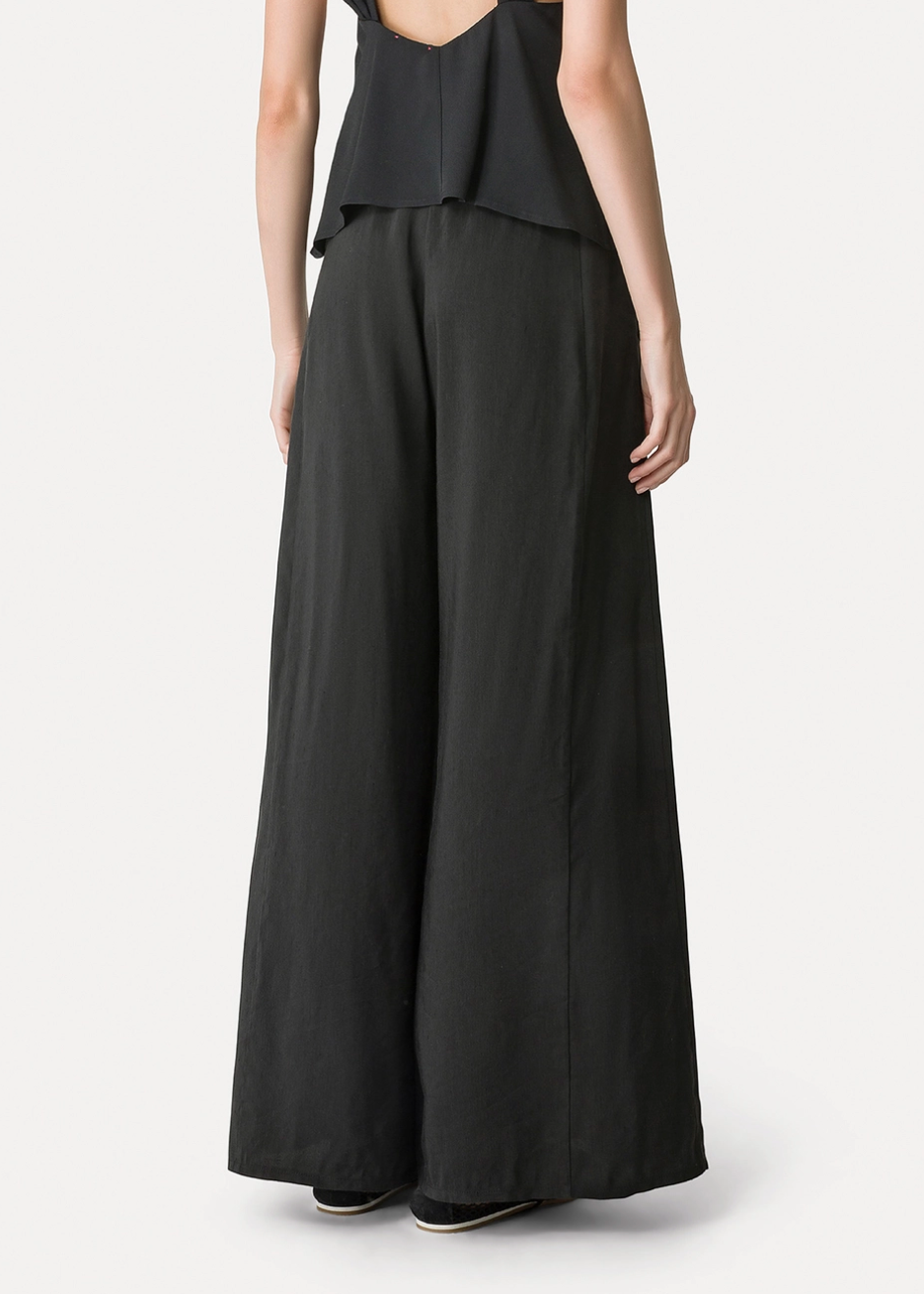person wearing forte forte Linen and Viscose Flared Trousers 14817