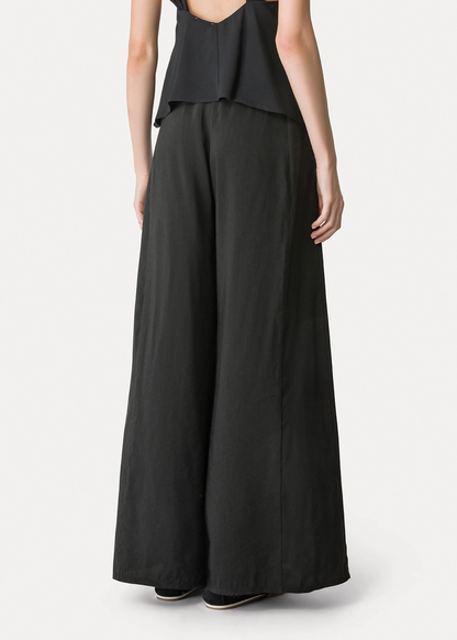 person wearing forte forte Linen and Viscose Flared Trousers 14817