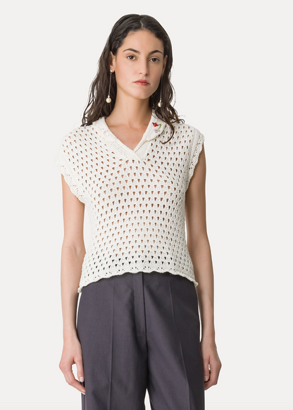 person wearing forte forte womens 14936 Embroidered Sleeveless Polo Shirt knit