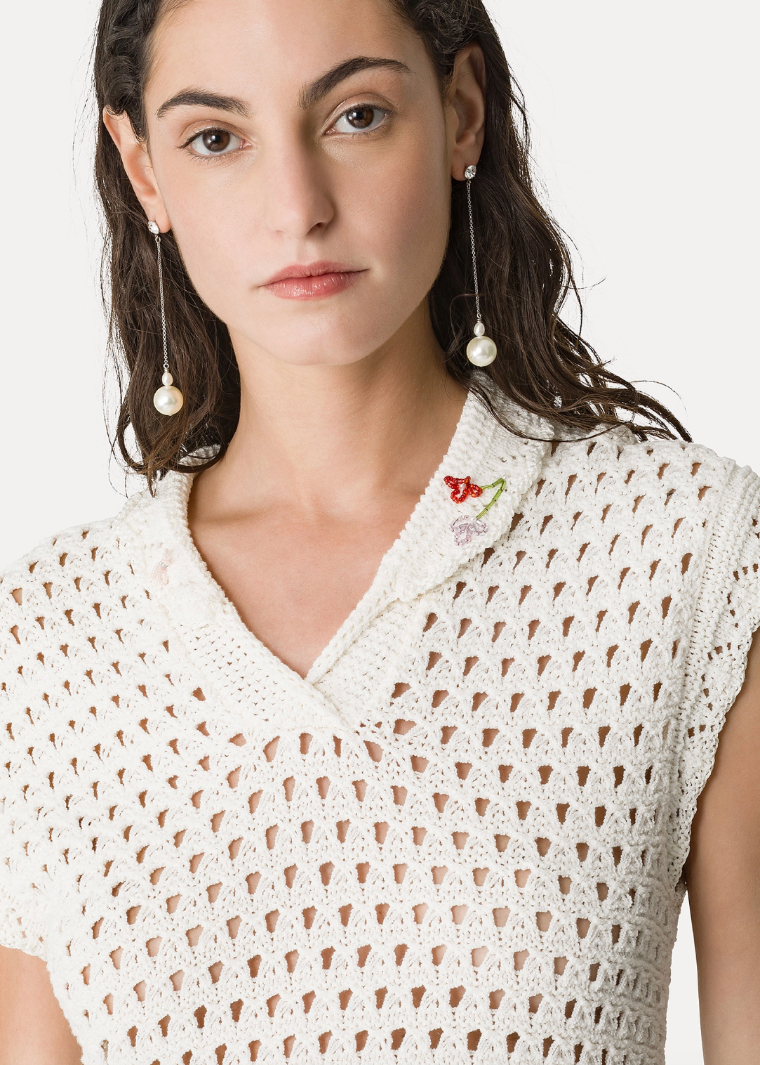 person wearing forte forte womens 14936 Embroidered Sleeveless Polo Shirt knit