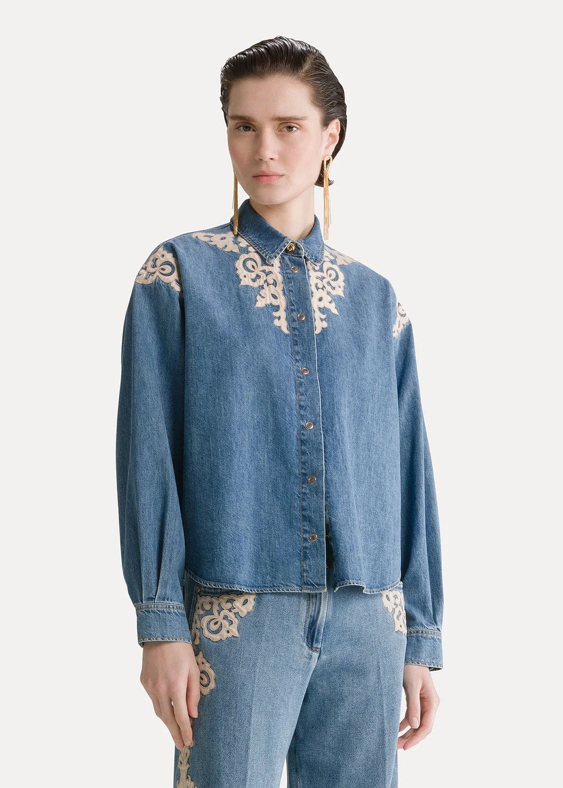 person wearing forte forte womens Embroidered Indigo Twill Boxy Shirt celeste wash denim
