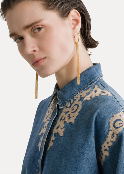 person wearing forte forte womens Embroidered Indigo Twill Boxy Shirt celeste wash denim