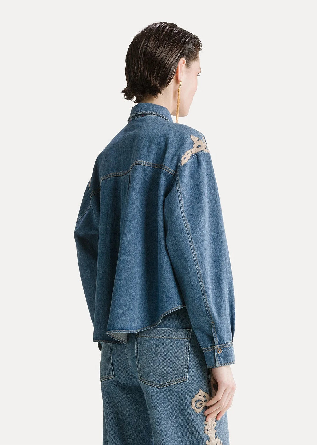 person wearing forte forte womens Embroidered Indigo Twill Boxy Shirt celeste wash denim