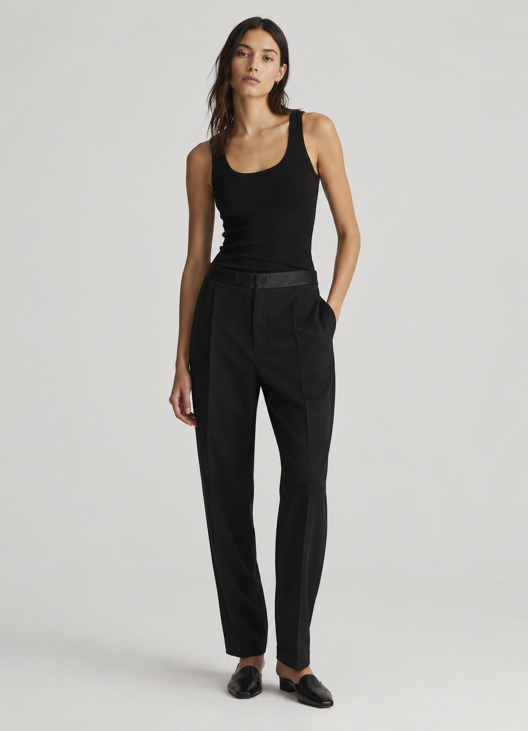 person wearing forte forte womens Stretch Cady Crepe Tuxedo Pants in Noir black