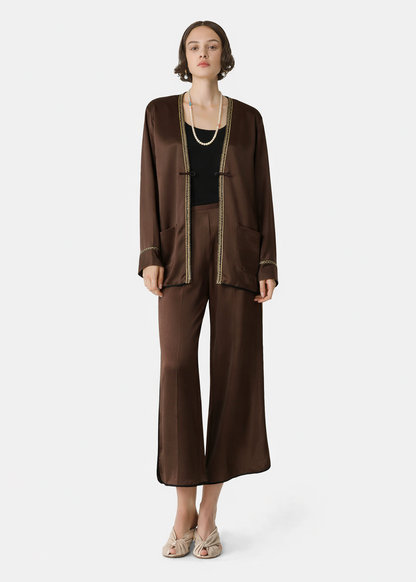person wearing forte forte womens Tang-Style Jacket in Chocolate Envers Satin