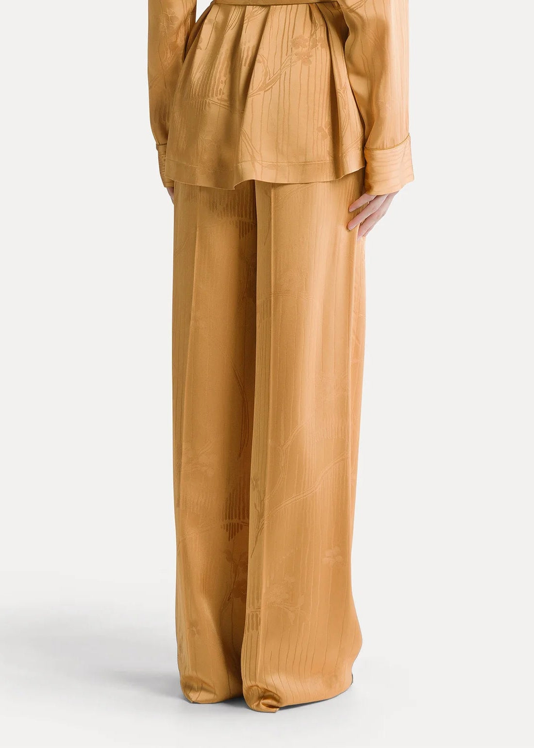 person wearing forte forte womens viscose Lotus Floral High-Waisted Jacquard Pants