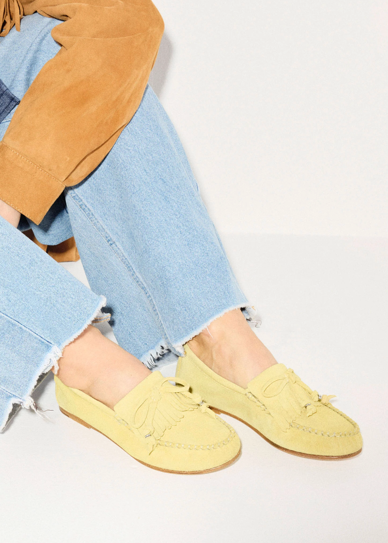 person wearing freda salvador womens Celeste Fringe Loafer in Citrus Suede