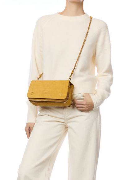 person wearing jerome dreyfuss Bobi Imprimé Croco Bag in Moutarde Taurillon