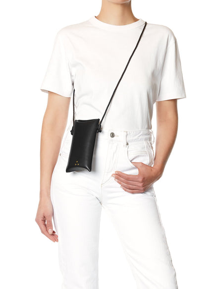 person wearing jerome dreyfuss Louis Mobile Crossbody in Black leather brass