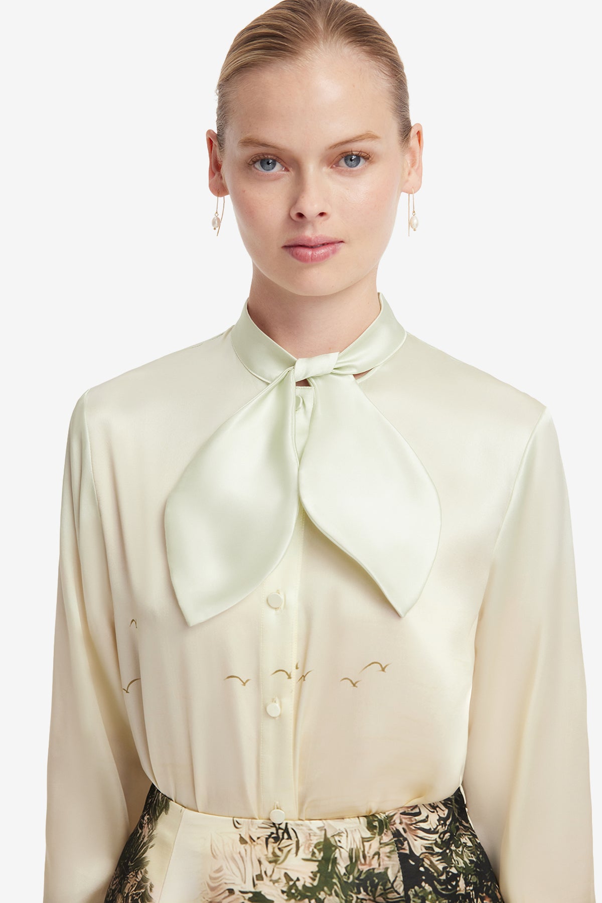 person wearing leo lin womens printed silk Cora Bow Blouse