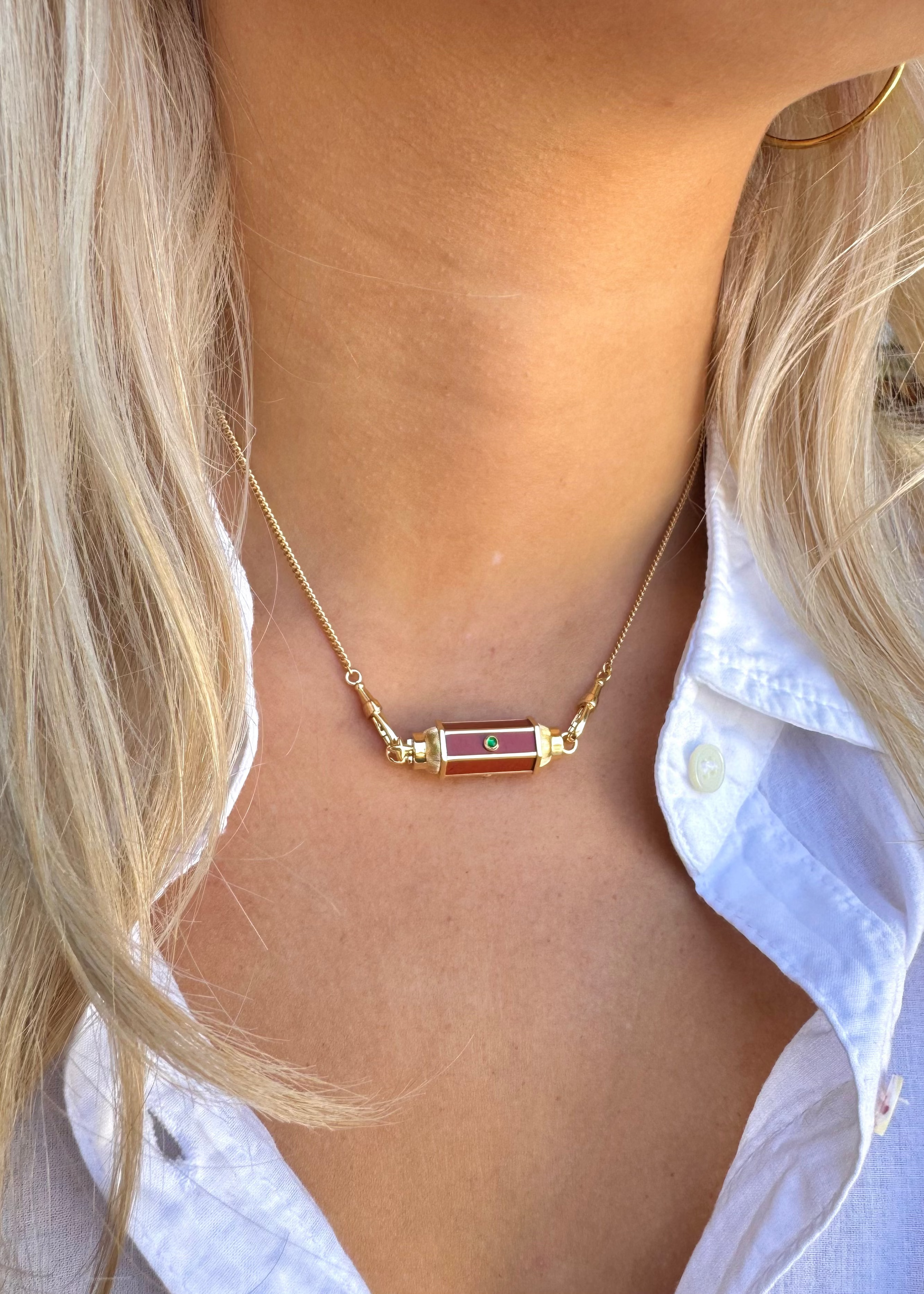 person wearing marie lichtenberg fine jewelry 18k yellow gold emerald Jasper Baby Locket gourmette chain