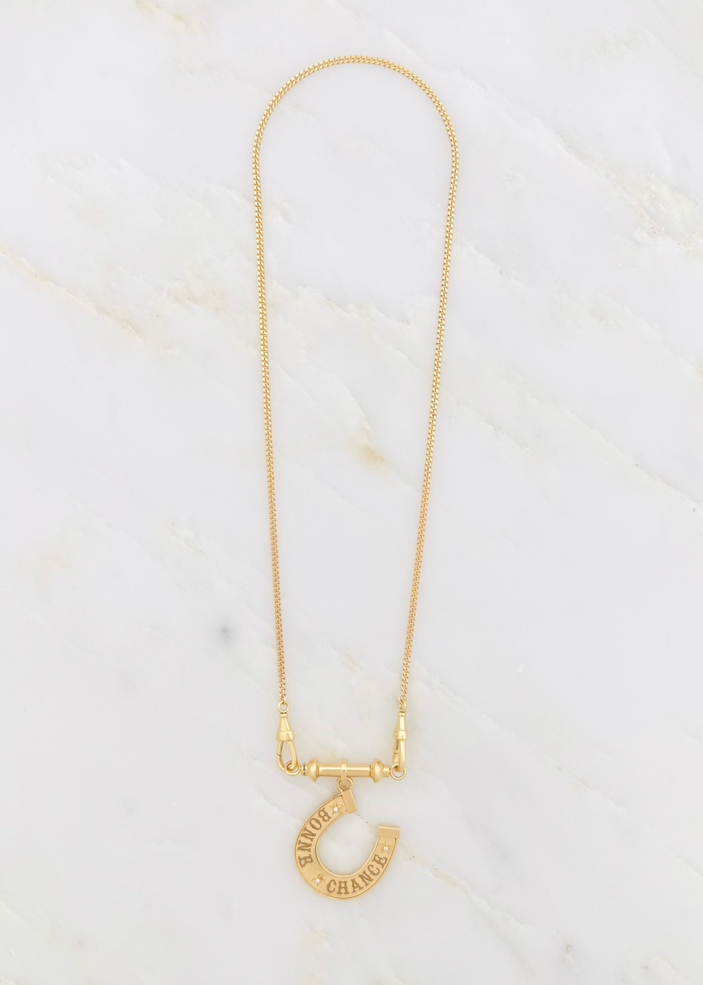 marie lichtenberg fine jewelry 18k yellow gold horseshoe Bonne Chance Small diamond charm gourmette chain