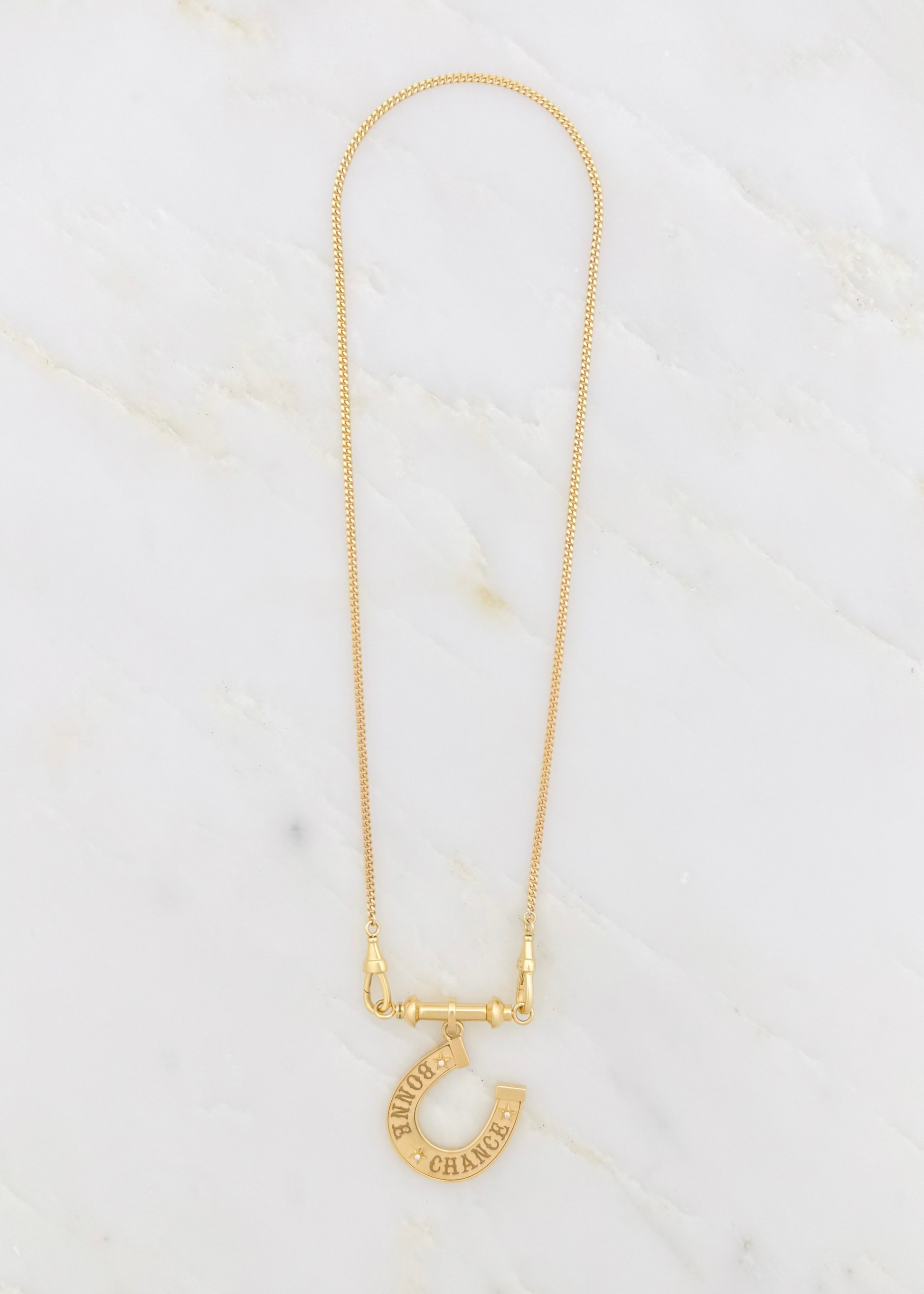 marie lichtenberg fine jewelry 18k yellow gold horseshoe Bonne Chance Small diamond charm gourmette chain