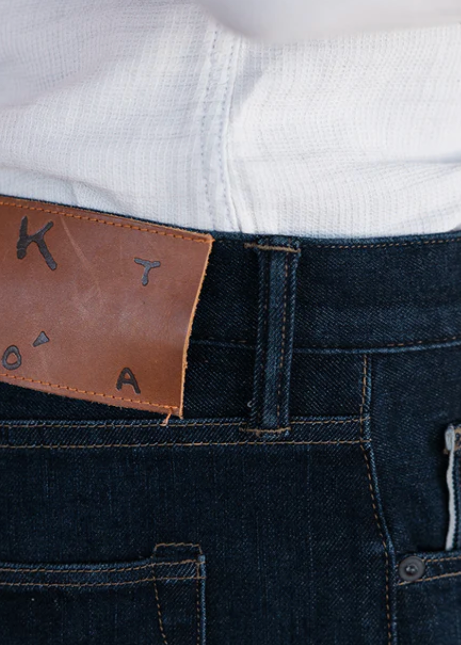 person wearing mens hiroshi kato The Hammer Straight 10.5oz Stretch Selvedge Jeans in Dizzy Wash