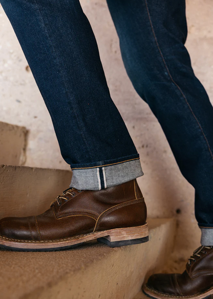 person wearing mens hiroshi kato The Hammer Straight 10.5oz Stretch Selvedge Jeans in Dizzy Wash