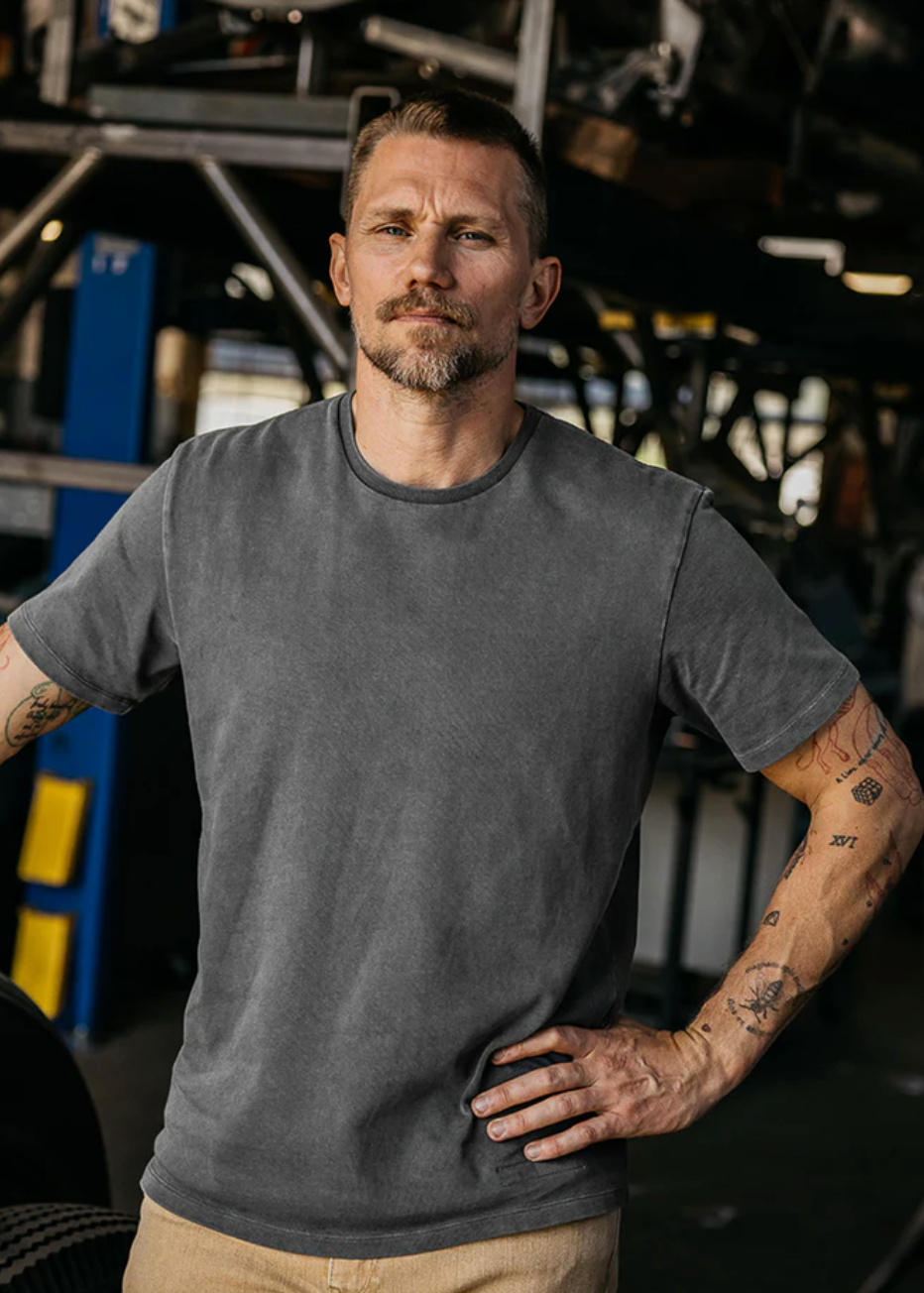 person wearing mens hiroshi kato The Stamp 9oz Organic Cotton Tee in Concrete