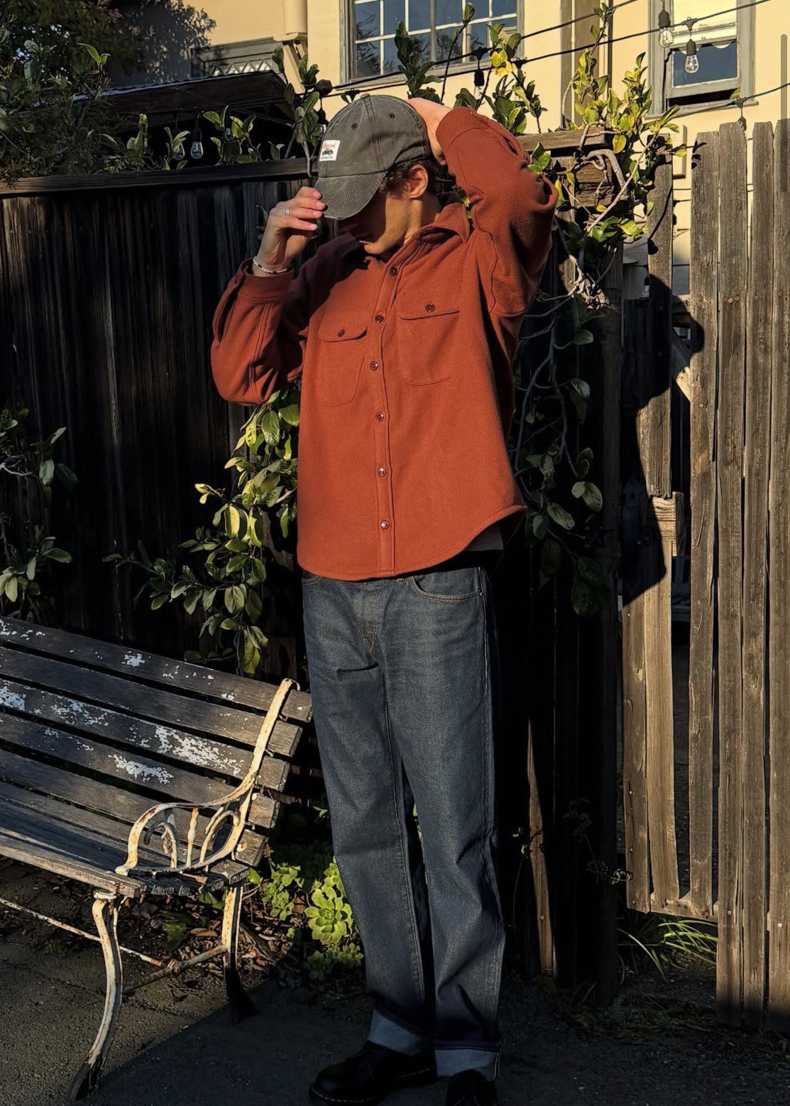 person wearing monostereo mens Wool Chamois Two Pocket Work Shirt in Red Earth