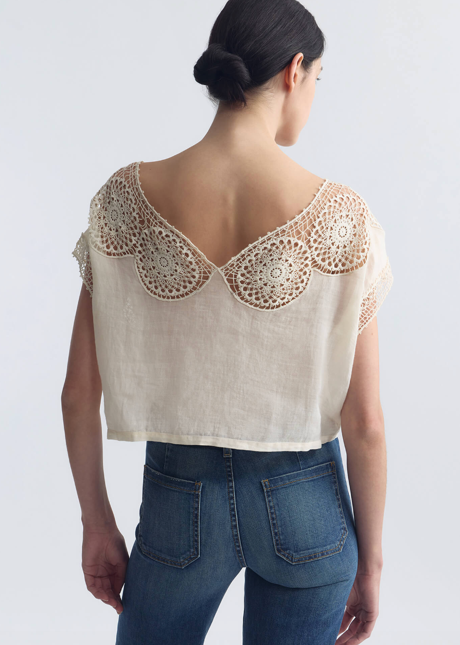 person wearing nili lotan womens Caila Top in ivory