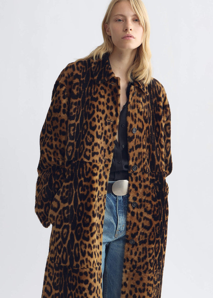 person wearing nili lotan womens Davelle Shearling Coat leopard print leather