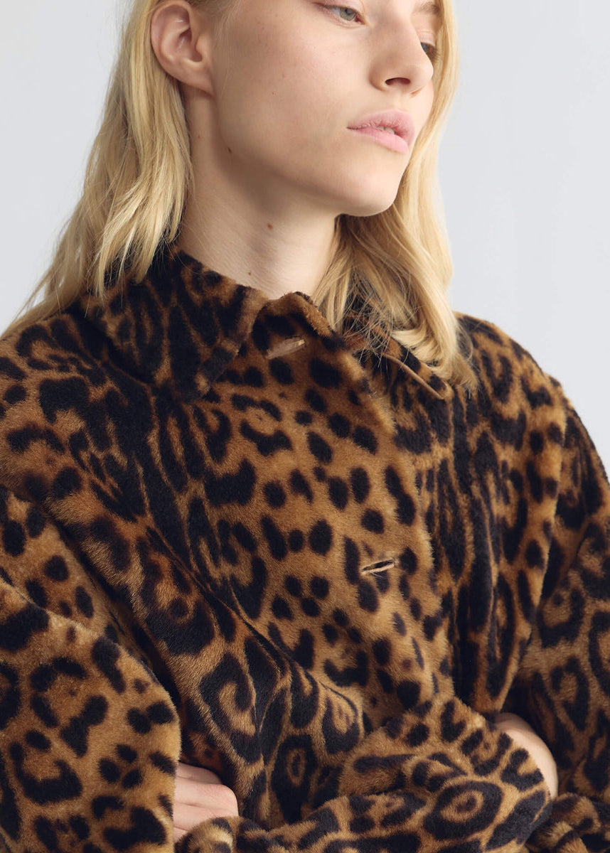 person wearing nili lotan womens Davelle Shearling Coat leopard print leather