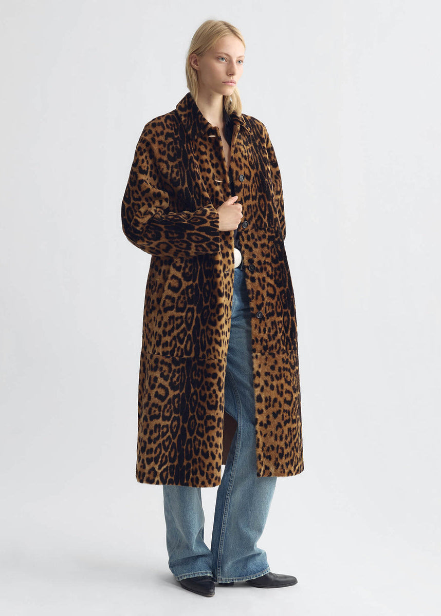 person wearing nili lotan womens Davelle Shearling Coat leopard print leather