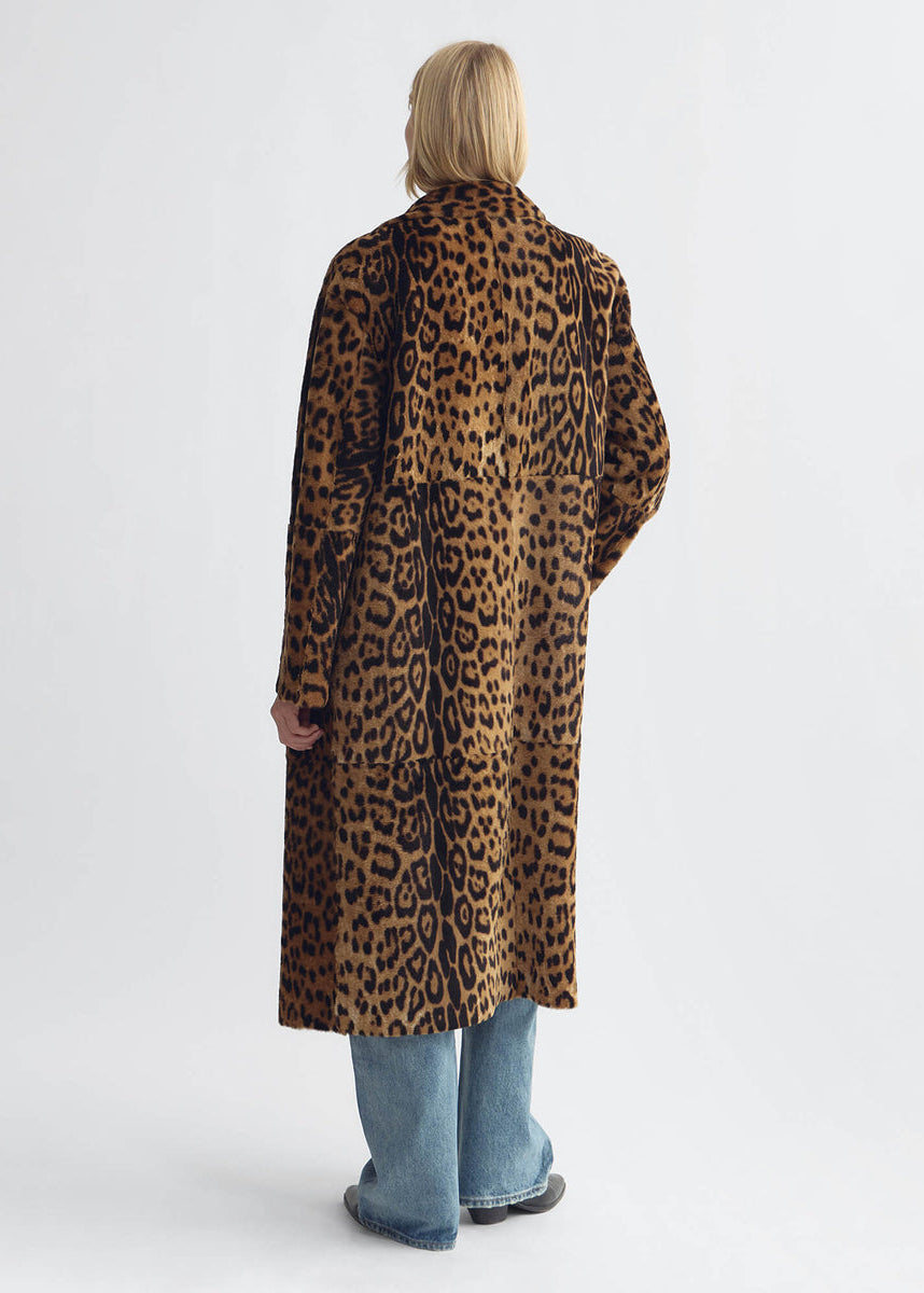 person wearing nili lotan womens Davelle Shearling Coat leopard print leather