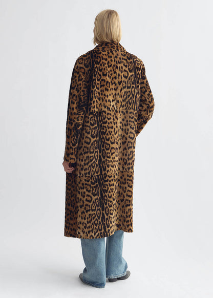 person wearing nili lotan womens Davelle Shearling Coat leopard print leather