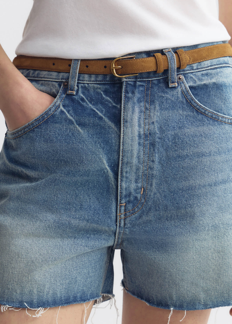 person wearing nili lotan womens Jane Suede Belt in tan martora with gold buckle