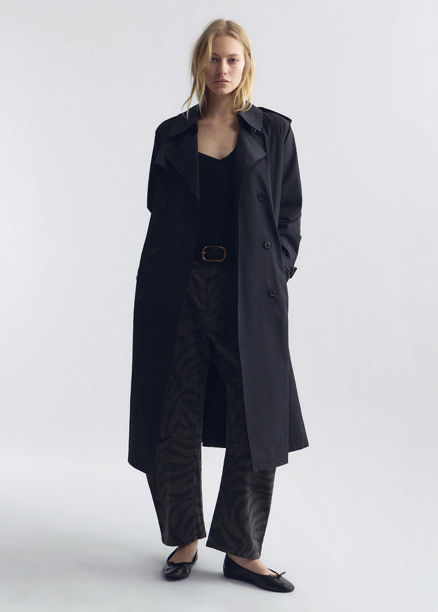 person wearing nili lotan womens Tanner Trench Coat in Black
