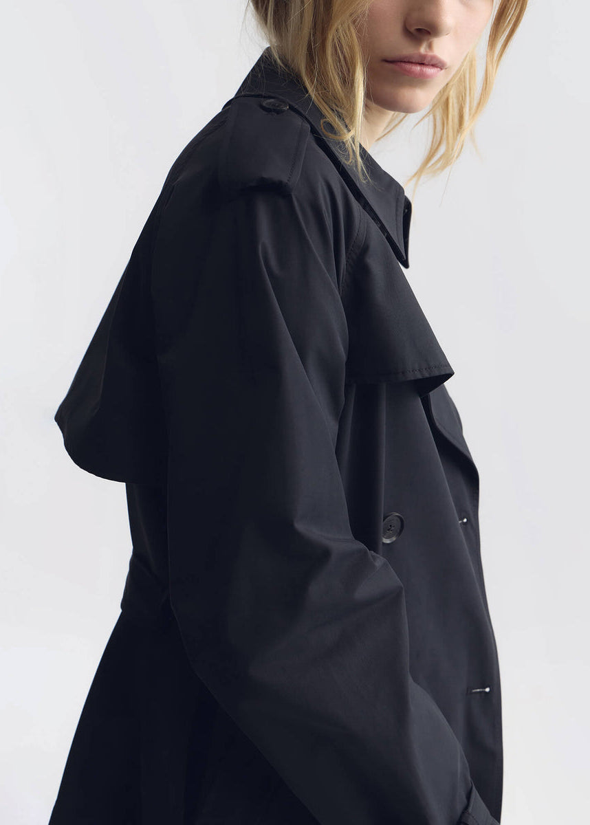 person wearing nili lotan womens Tanner Trench Coat in Black
