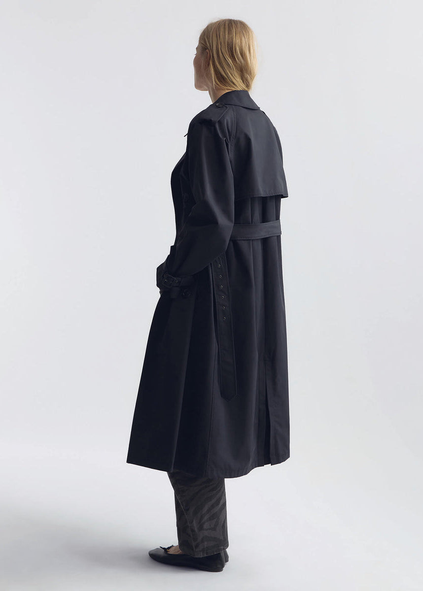 person wearing nili lotan womens Tanner Trench Coat in Black