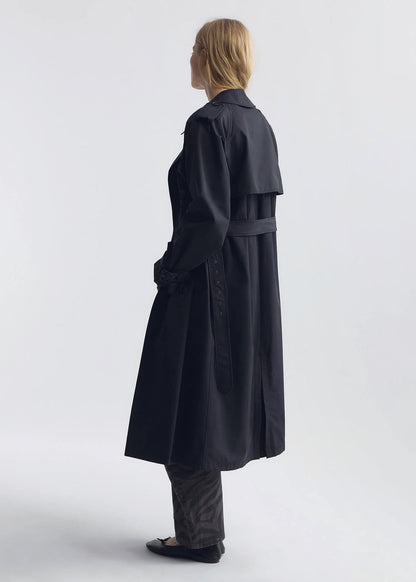 person wearing nili lotan womens Tanner Trench Coat in Black
